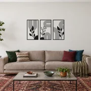 Ritmo Botânico preto, composição metálica de três módulos, tamanho 100 cm, em ambiente residencial