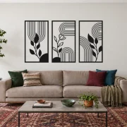 Ritmo Botânico preto, composição metálica de três módulos, tamanho 150 cm, em ambiente residencial